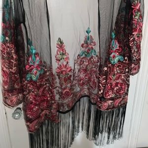 Cover up or wear with a dress